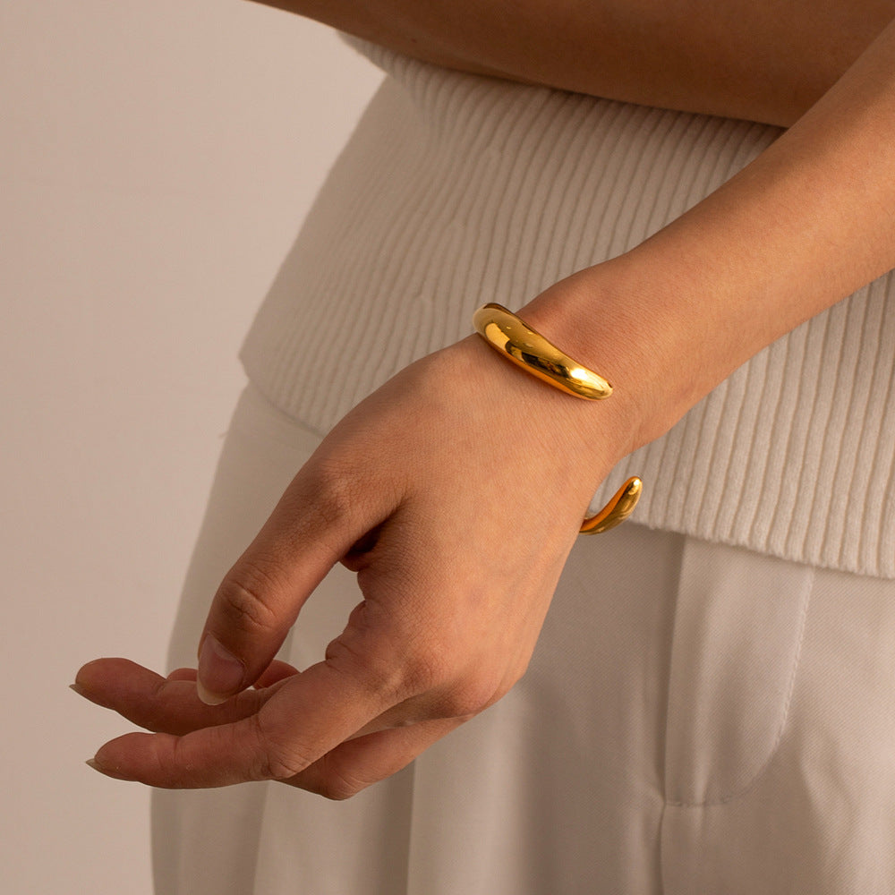 Audrina Contemporary Gold Bangle