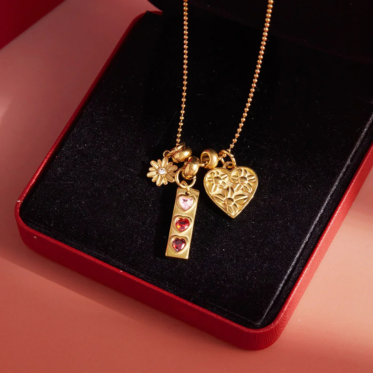 Tatiana Triple Heart Charm Necklace Image