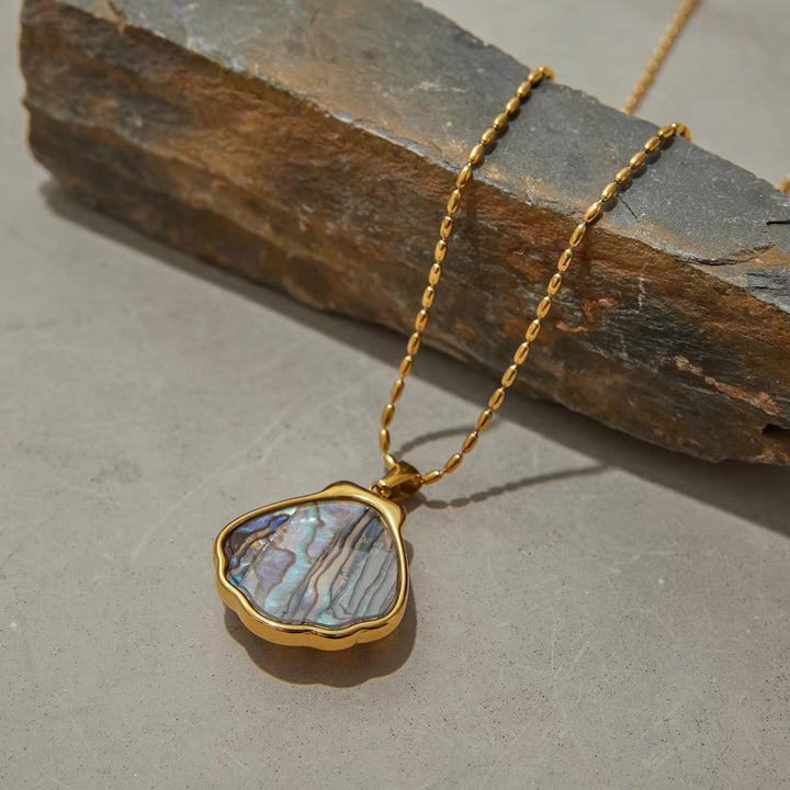 Nixie Gold Seashell Pendant