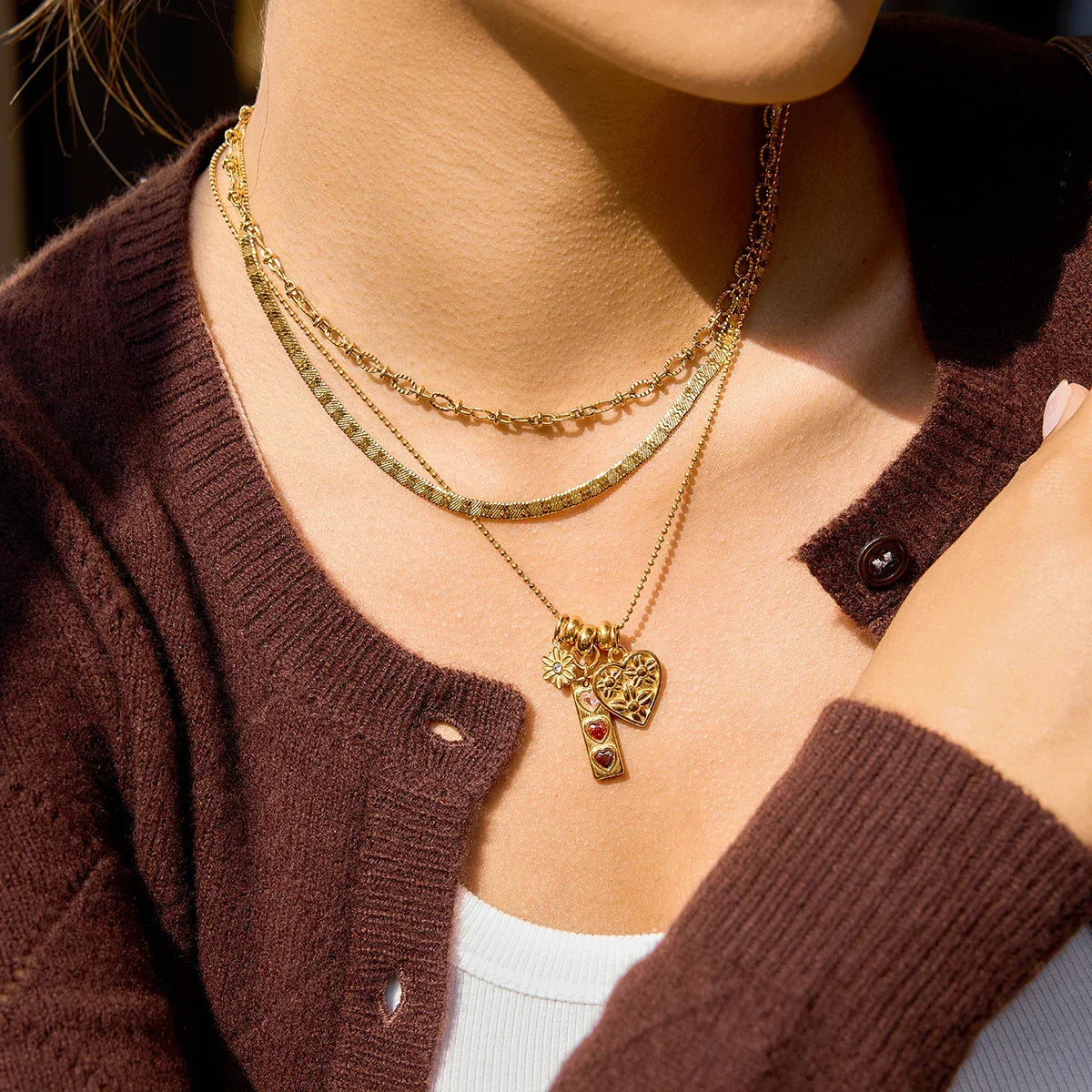 Tatiana Triple Heart Charm Necklace Image